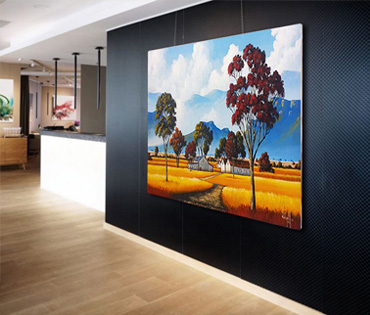 A Nicky van Rensburg painting of a colourful landscape