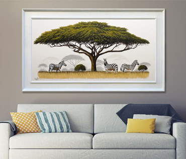 A Nicky van Rensburg painting of three zebras under an umbrella thorn tree