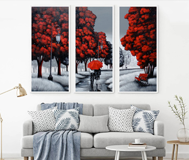 A Nicky van Rensburg painting of a couple walking with an umbrella